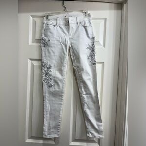 00P White House black market skinny crop in white with silver threaded details